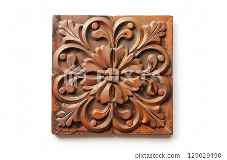 Four terracotta tiles forming a seamless floral pattern, ideal for adding a touch of elegance to interior design projects 129029490