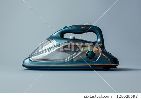 Modern electric iron standing on a grey background, ready to be used for wrinkle free clothes 129029598