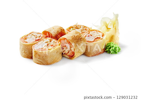Delicious sushi rolls with omelette, salmon, crab meat, and cream cheese on white background Delicious sushi rolls with omelette, salmon, crab meat, and cream cheese on white background 129031232