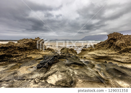 Rugged coastal landscape of famara beach 129031358
