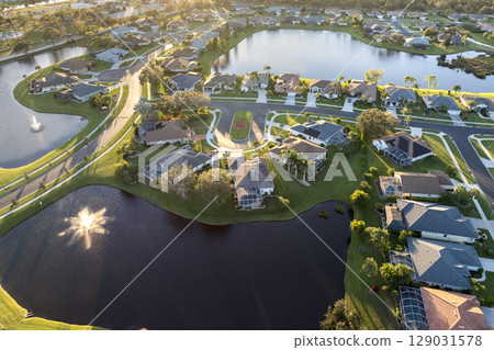 Wealthy residential area in USA suburbs. Rich neighborhood with expensive suburban homes in southwest Florida 129031578