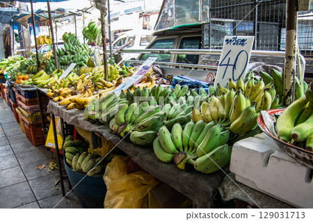 Bananas lined up at a tropical food stall Bananas lined up at a tropical food stall 129031713