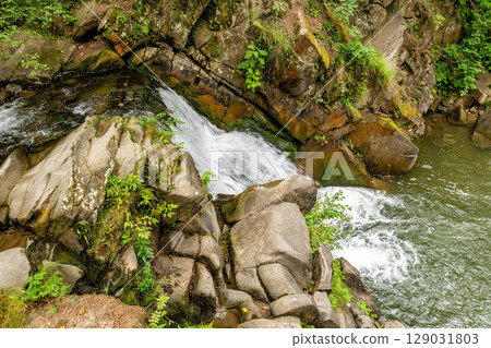 Waterfall Zaskalnik in Szczawnica (Poland) Waterfall Zaskalnik in Szczawnica (Poland) 129031803