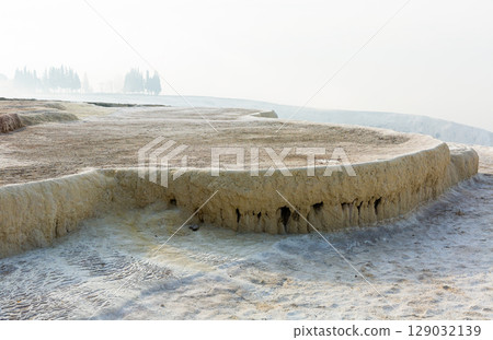 Natural travertine pools and terraces in Pamukkale 129032139