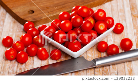 photo of heap cherry tomato on table 129032238