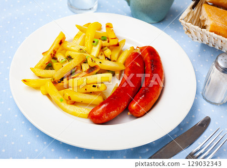 Eastern european cuisine - sausages with potatoes 129032343