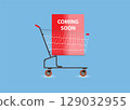 Shopping cart with Coming Soon word on blue background. 129032955