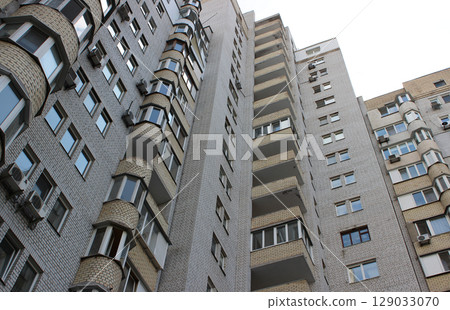 Multi-storey urban building lower point of view stock photo  129033070