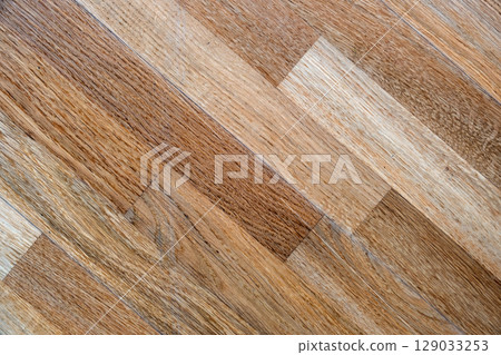 Textured grunge wooden background. Dark yellow natural backdrop. 129033253