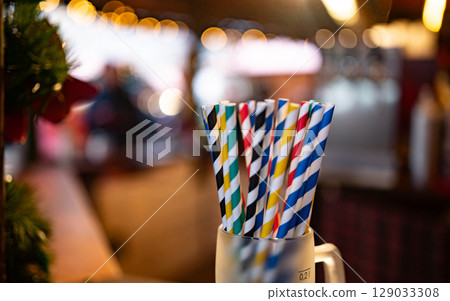 Cocktail Straws In A Glass At A Cafe 129033308