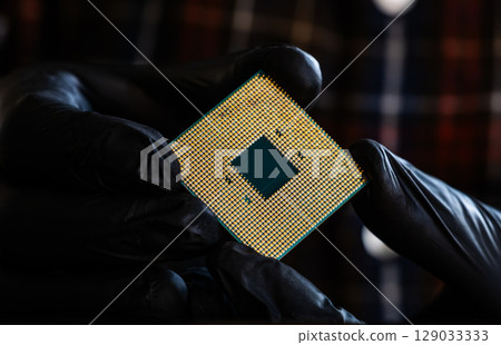 Computer Repairman Holding Pc Processor 129033333