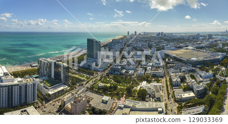 South Beach high luxurious hotels and apartment buildings. American southern seashore of Miami Beach city. Tourist infrastructure in Florida, USA 129033369