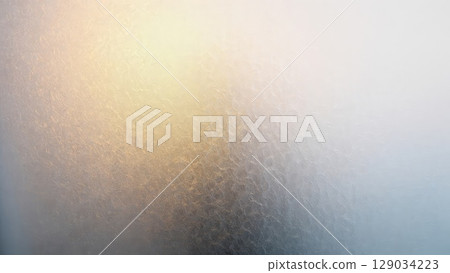 Abstract textured surface resembles frosted or fogged glass, creating a soft, muted, and atmospheric aesthetic. Generative AI. 129034223