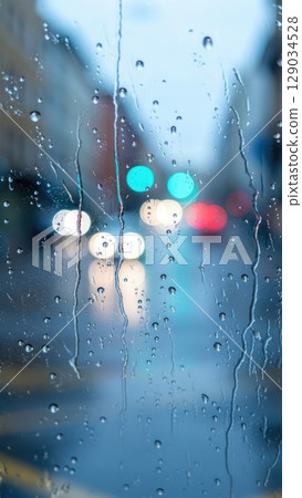 Raindrops on window with city lights blurred behind, moody rainy evening vibe. Soft emotional wallpaper. Generative AI. 129034528