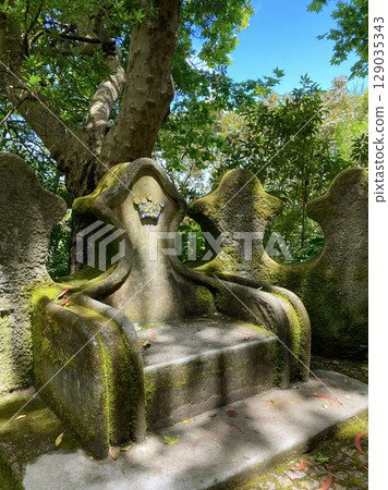A stone throne in the park of Vila Sassetti in Sintra, Portugal A stone throne in the park of Vila Sassetti in Sintra, Portugal 129035343