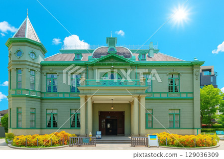 The old Fukuoka Prefectural Public Hall and Guest House with young leaves and fresh greenery 129036309