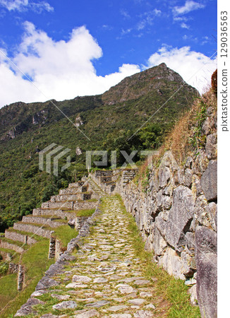 Machu Picchu Mountain seen from the Machu Picchu ruins, Peru, South America 129036563
