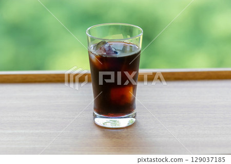 Iced coffee in a glass Iced coffee in a glass 129037185