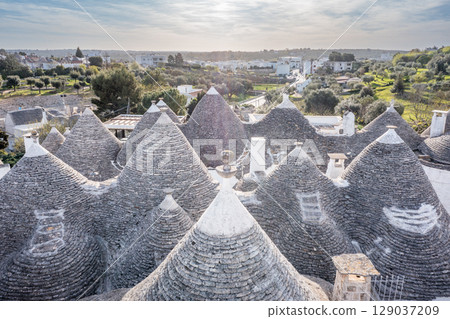 Alberobello trulli rooftops, Puglia, Italy, showcasing unique architecture and cultural heritage.. 129037209