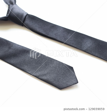 black necktie isolated on white background, father day concept and business style black necktie isolated on white background, father day concept and business style 129039059