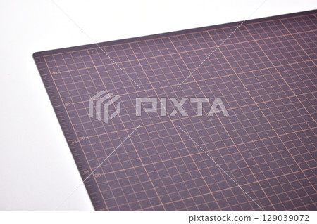black cutting mat board on white background with line and scale measure guide pattern for object art design, tool equipment of diy craft work black cutting mat board on white background with line and scale measure guide pattern for object art design, tool equipment of diy craft work 129039072