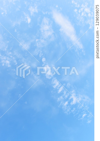 beautiful blue sky and white fluffy group of clouds with sunrise in the morning, natural background beautiful blue sky and white fluffy group of clouds with sunrise in the morning, natural background 129039075
