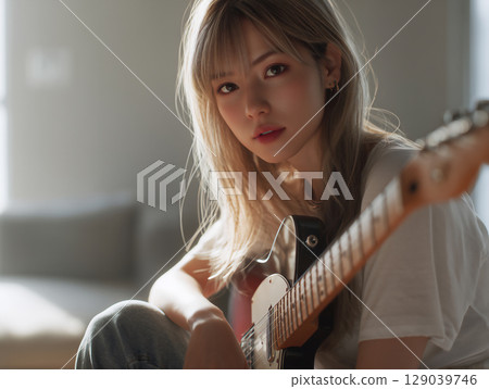 拿著吉他的女人的肖像 129039746
