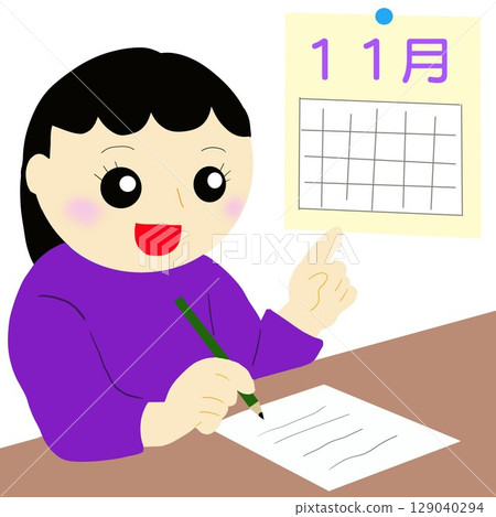 一位女士正在製定十一月的計劃 129040294