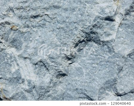 Natural stone texture background with rough surface and detailed structure 129040640