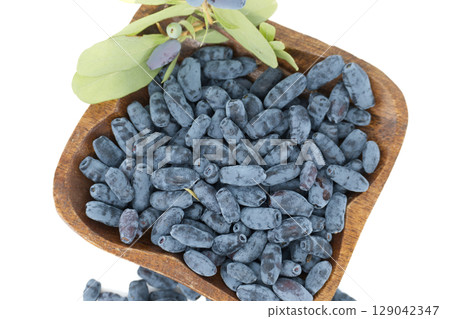 Borealis Honeyberry Haskap berries isolated on white background 129042347