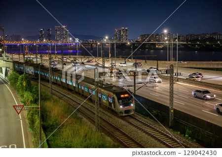 Night View of Seoul with Train and Highway by Han River Night View of Seoul with Train and Highway by Han River 129042430