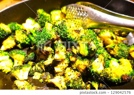 Lots of grilled broccoli Lots of grilled broccoli 129042576
