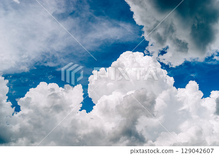 Summer sky with growing cumulonimbus clouds b-5 film style Summer sky with growing cumulonimbus clouds b-5 film style 129042607