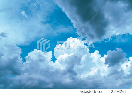 Summer sky with growing cumulonimbus clouds c-3 light color 129042611