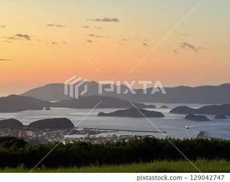Evening view of Fukue from Mt. Onidake and the sea of the Goto Islands 129042747