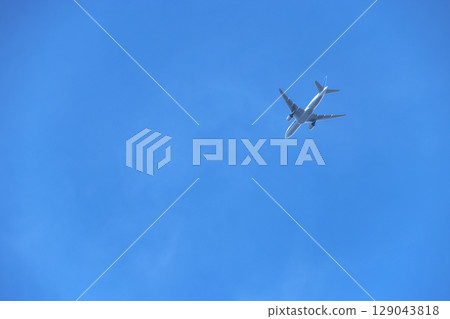 Airplane and blue sky 129043818