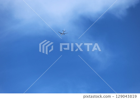Airplane and blue sky Airplane and blue sky 129043819