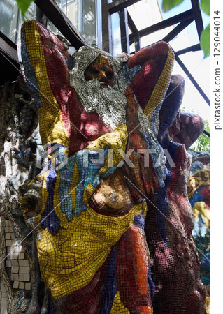 A stunningly vibrant and captivating Mosaic Sculpture displayed prominently in an Urban Art Space 129044014