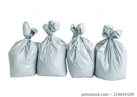 This is a collection of gray trash bags designed for effective waste management 129044189