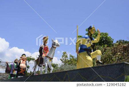 Sculpture of the Buddhist god Hanuman in the form of a monkey and his entourage 129045282