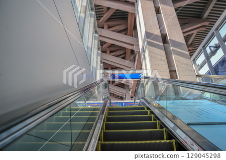 March 25 2025 Escalator Leading to Urban Architecture Under a Structural Canopy, Japan March 25 2025 Escalator Leading to Urban Architecture Under a Structural Canopy, Japan 129045298