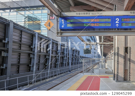 March 25 2025 Modern Railway Station Platform with Departure Information, Japan March 25 2025 Modern Railway Station Platform with Departure Information, Japan 129045299