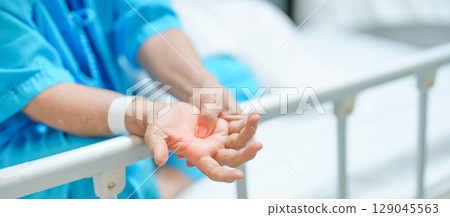 Elderly asian Patient Woman recovery after surgery. Happy Senior illness resting in hospital. Influenza, Fever, treatment, Insurance, Health care and medical, world day of Sick and Health day concept Elderly asian Patient Woman recovery after surgery. Happy Senior illness resting in hospital. Influenza, Fever, treatment, Insurance, Health care and medical, world day of Sick and Health day concept 129045563