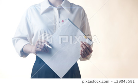 Business concept. A confident gesture by a female leader with leadership and innovative attitude. 129045591