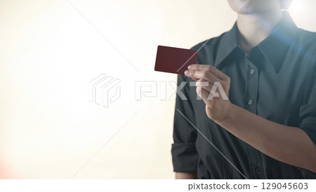 Business concept. A confident gesture by a female leader with leadership and innovative attitude. Business concept. A confident gesture by a female leader with leadership and innovative attitude. 129045603