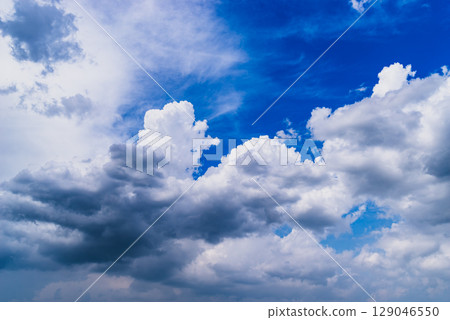 Summer sky with cumulonimbus clouds spreading out a-2 High saturation contrast 129046550