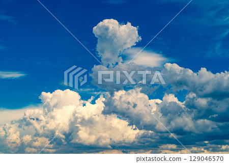 Summer sky with cumulonimbus clouds d-4 Emphasis on warm and cool colors Summer sky with cumulonimbus clouds d-4 Emphasis on warm and cool colors 129046570