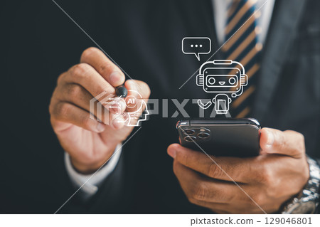 AI chatbot on a phone screen is used by a businessman to explore chat robot application, using a stylus to interact with an AI graphic visualizing technology and communication solutions 129046801