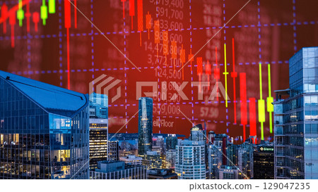 businessman hand writing on paper with graph chart and pen on city background with city buildings, skyscrapers and skyscrapers 129047235