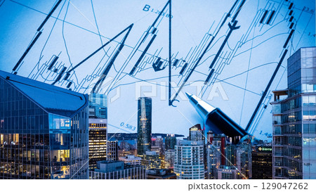 businessman hand writing on paper with graph chart and pen on city background with city buildings, skyscrapers and skyscrapers 129047262